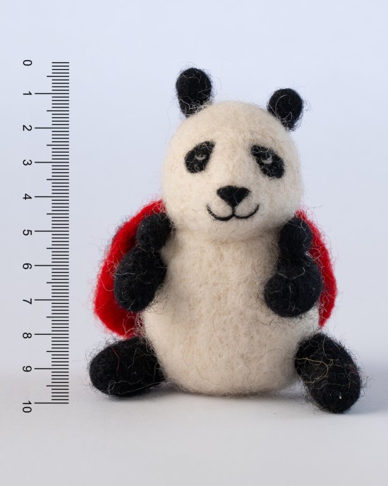Felt panda with ladybird cape toy