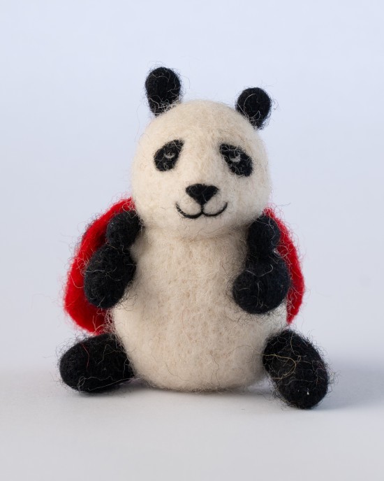 Felt panda with ladybird cape toy